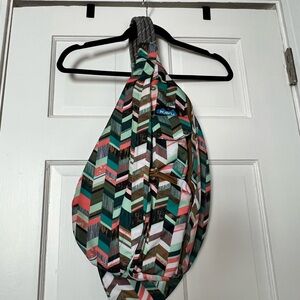 Kavu Chevron Sling Bag in Green, Pink, and Brown